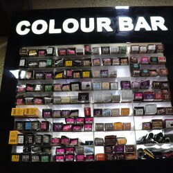Gazibo Hair & Beauty Salon storefront at night